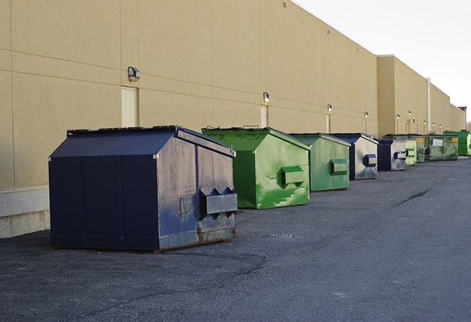 a pack of different construction bins lined up for service in Brandon, MS